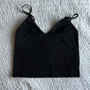 Adjustable ribbed crop top. Says One size but fits more XS/S. Wore only 6 times
